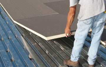 benefits of insulating Washington Village flat roofing